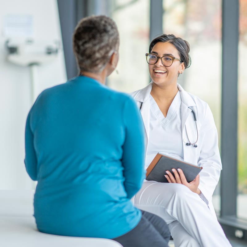 doctor talking to patient