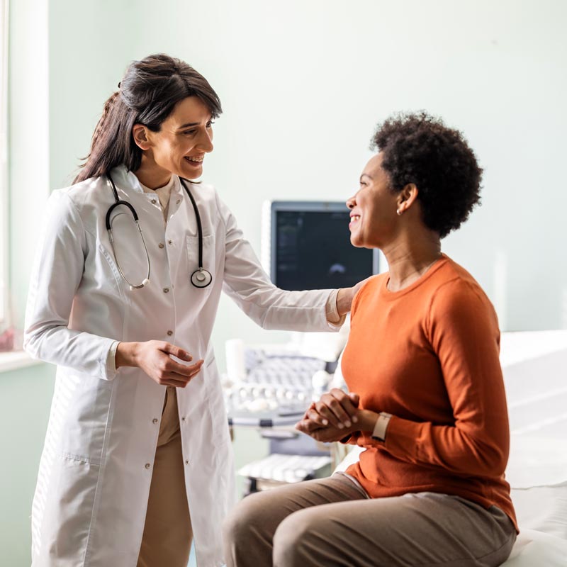 doctor talking to patient